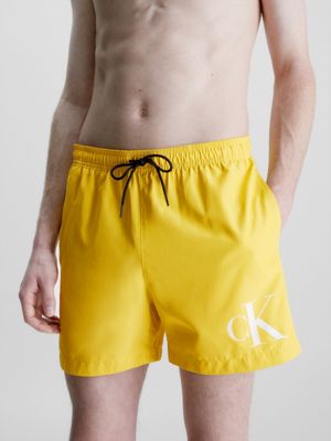 Calvin Klein all-over monogram logo swim shorts in black