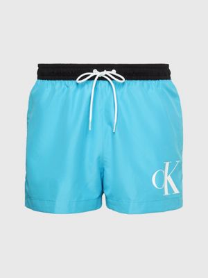 Kurze Badeshorts mit Kordelzug - CK Monogram Calvin Klein® | KM0KM00901CU8