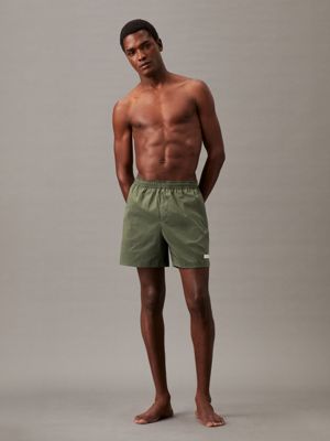 Green calvin klein swim shorts hotsell