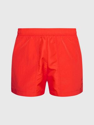 Orange calvin klein swim shorts hotsell