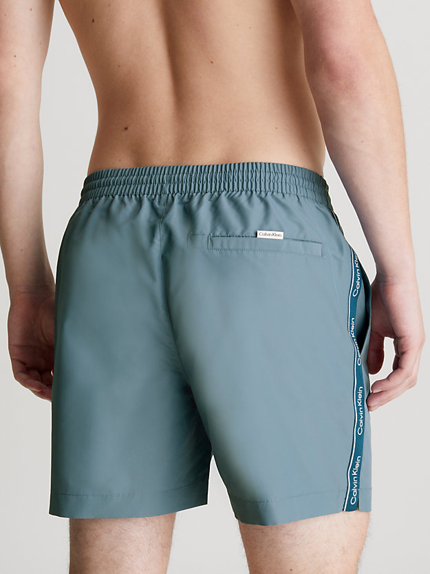 muted cerulean medium drawstring swim shorts - logo tape for men calvin klein