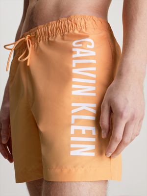 Calvin klein best sale orange swim shorts