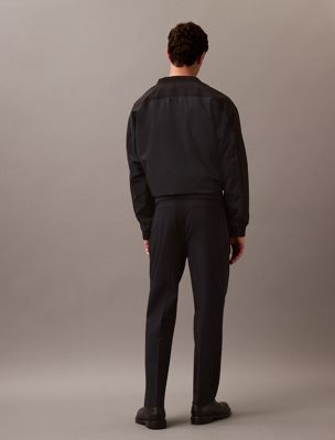 black soft pleat tailored trousers for men calvin klein