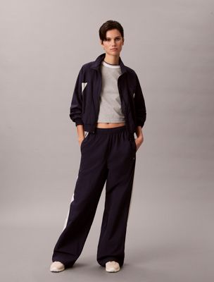 blue relaxed nylon track pants for women 
