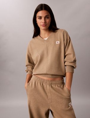 beige sweatshirt aus baumwoll-frottee mit v-ausschnitt für damen - calvin klein jeans