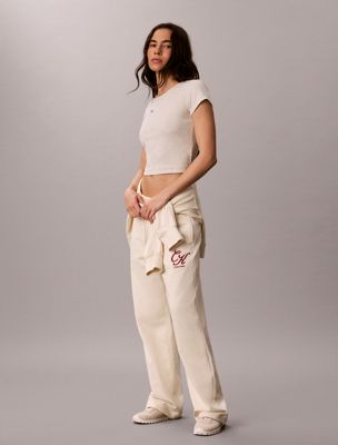 beige frottee-jogginghose mit logo-grafik für damen - calvin klein jeans