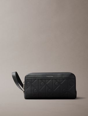 black embossed emblem logo dopp kit for men calvin klein