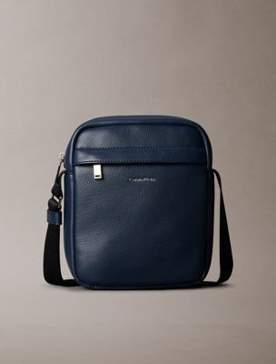 blue micro pebble reporter bag for men calvin klein
