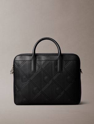 black embossed allover emblem logo commuter bag for men calvin klein