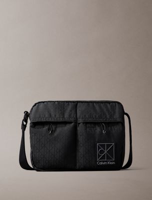 black water-repellent ripstop crossbody camera bag for men calvin klein