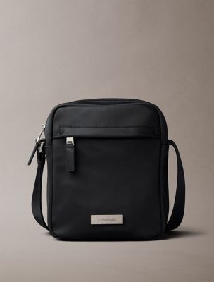 black water-repellent nylon reporter bag for men calvin klein