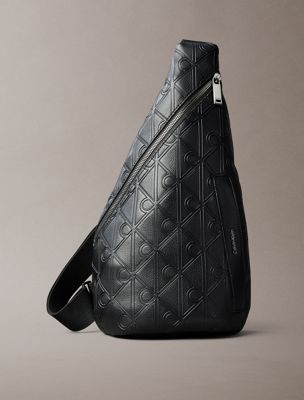 black debossed allover emblem logo sling bag for men calvin klein