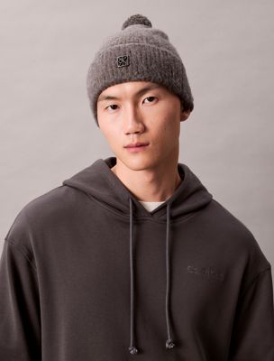 dark grey wool blend emblem logo pom pom beanie for men calvin klein