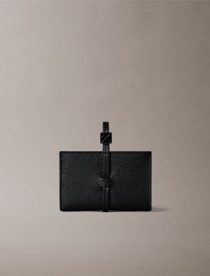 black pebbled leather rfid wrist strap wallet for women calvin klein