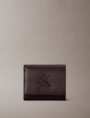 brown embossed monogram bifold wallet for women calvin klein