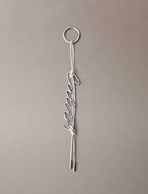 silver metalowy brelok do torebki z frędzlami i logo dla kobiety - calvin klein