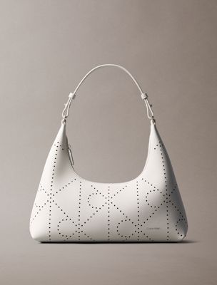 white perforated emblem logo shoulder bag for women calvin klein