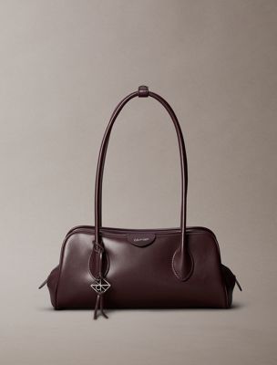 brown emblem logo shoulder bag for women calvin klein