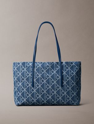 blue large denim jacquard tote bag with pouch for women calvin klein