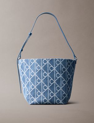 blue denim allover emblem logo bucket bag for women calvin klein