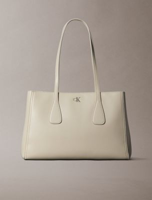 beige monogram hardware tote bag for women calvin klein
