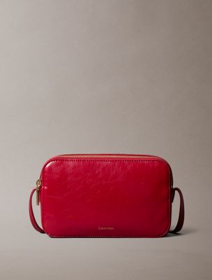 red torba fotograficzna przez ramię z błyszczącym foliowym logo dla kobiety - calvin klein
