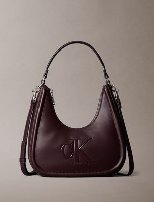 brown embossed monogram crescent bag for women calvin klein