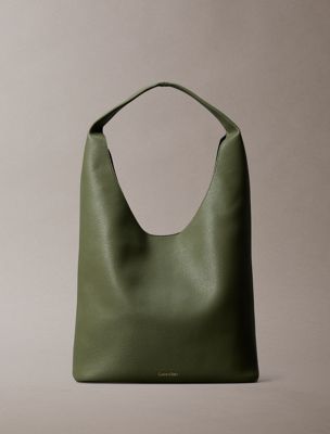 green pebble grain slouchy curved bag for women calvin klein