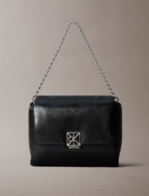 black padded emblem hardware crossbody bag for women calvin klein