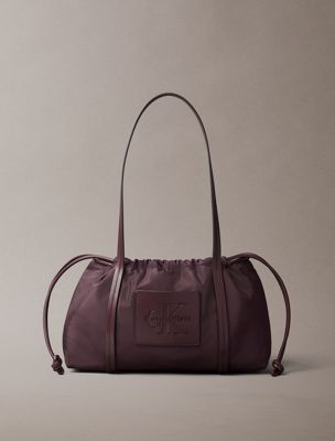 brown embossed monologo satchel bag for women calvin klein