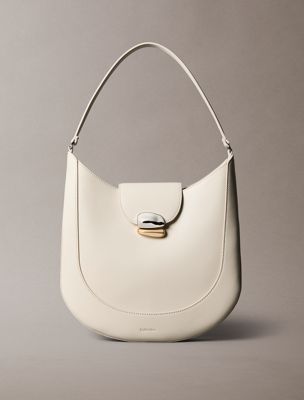 beige sculptural hardware shoulder bag for women calvin klein