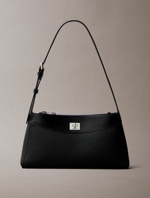 black schultertasche mit charakteristischem drehverschluss für damen - calvin klein