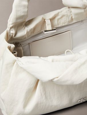 wind chime twist crossbody bag for women calvin klein jeans