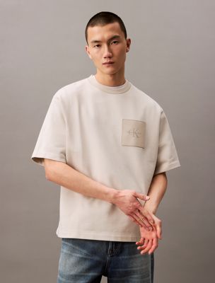 multi oversized logo patch t-shirt for men calvin klein jeans