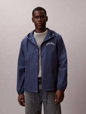 blue grafische logo-jacke mit kapuze von coach für herren - calvin klein jeans