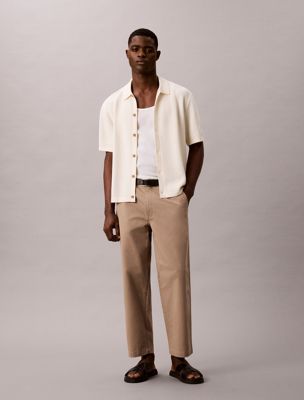 brown 90s loose cropped chino trousers for men 