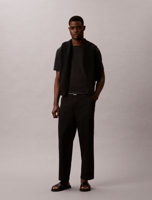 black 90s loose cropped chino trousers for men 