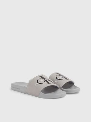 grey calvin klein sliders
