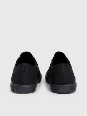 Black canvas shop trainers womens