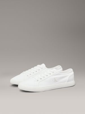 triple bright white canvas low profile trainers for men calvin klein jeans