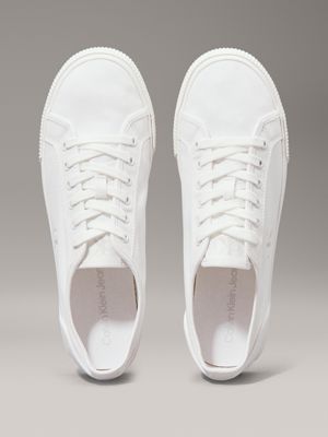 triple bright white canvas low profile trainers for men calvin klein jeans