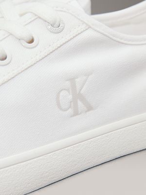 triple bright white canvas low profile trainers for men calvin klein jeans