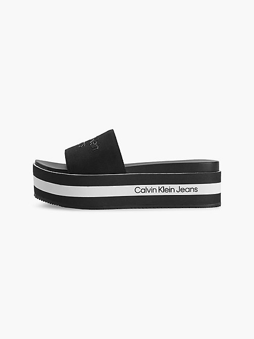 HW0HW00535 Mules Jean Calvin Klein en coloris Noir Femme Chaussures Chaussures plates Sandales et claquettes 