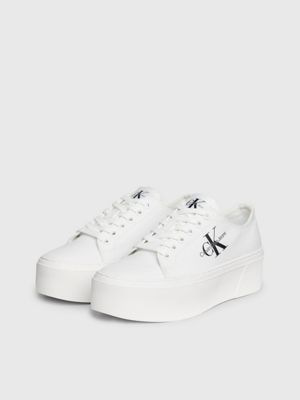 Calvin klein zolah 2025 white canvas flatform trainers