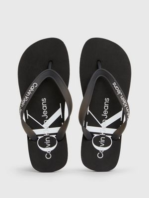 Calvin klein jeans flip hot sale flops