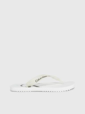 White calvin klein flip on sale flops