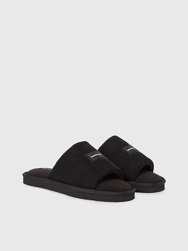 black slipper in lammfelloptik für damen - calvin klein jeans